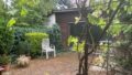 Gartenhäuschen mit Terrasse